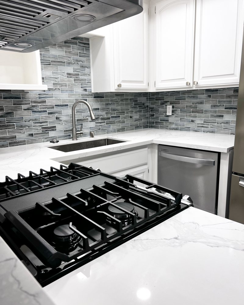 Kitchen counters and appliances after Maid4You post construction cleaning
